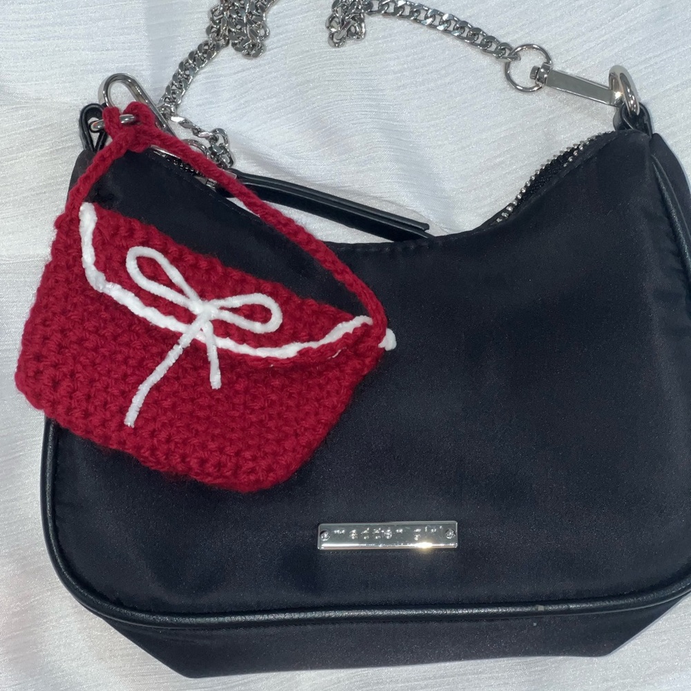 Red and white crochet mini bag with white ribbon